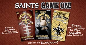 Three Saints themed scratch off games on a brown football background with text that reads "Saints GAME ON!"