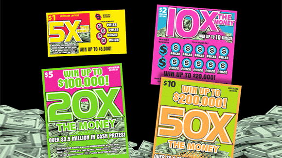 Four different colorful scratch off tickets on a pile of money against a black background