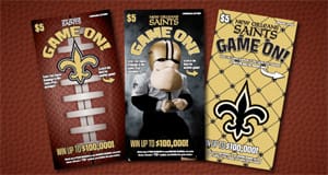 Three Saints themed scratch off games on a brown football surface