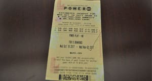Close up of a Powerball ticket on a dark surface