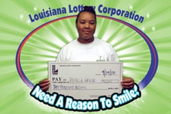Woman with an oversized check appears ina. digital circle labeled "Need a Reason to Smile?" on a green striped digital background